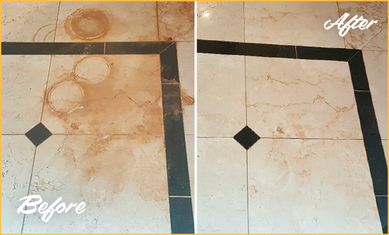 Before and After Picture of a Mission Viejo Hard Surface Restoration Service on a Marble Floor to Eliminate Rust Stains